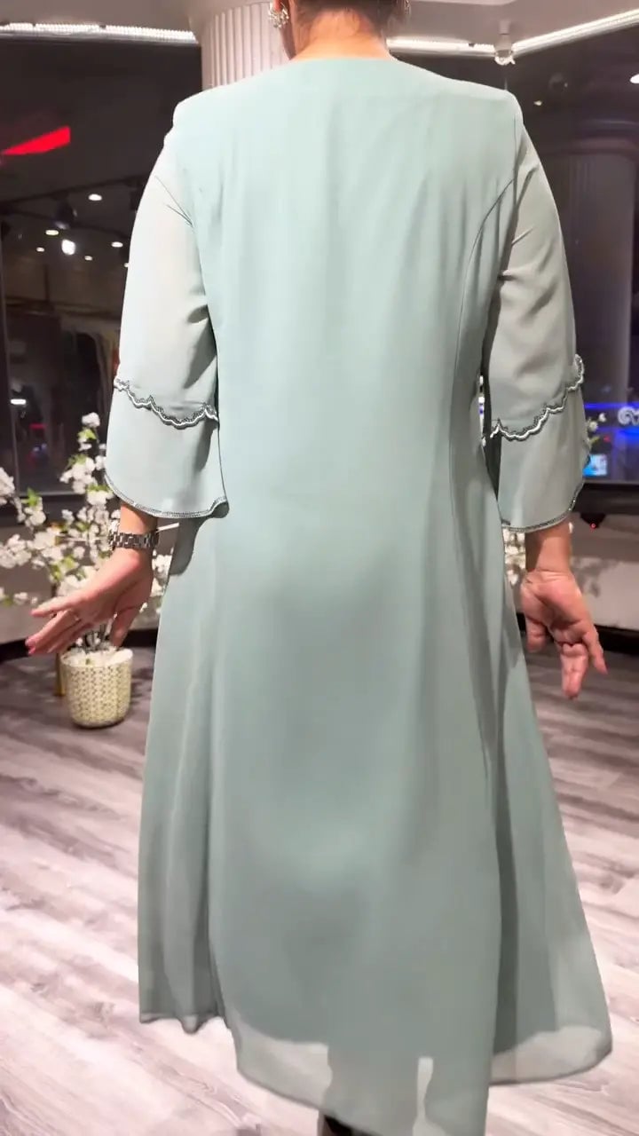 Doris – Robe en mousseline à col rond