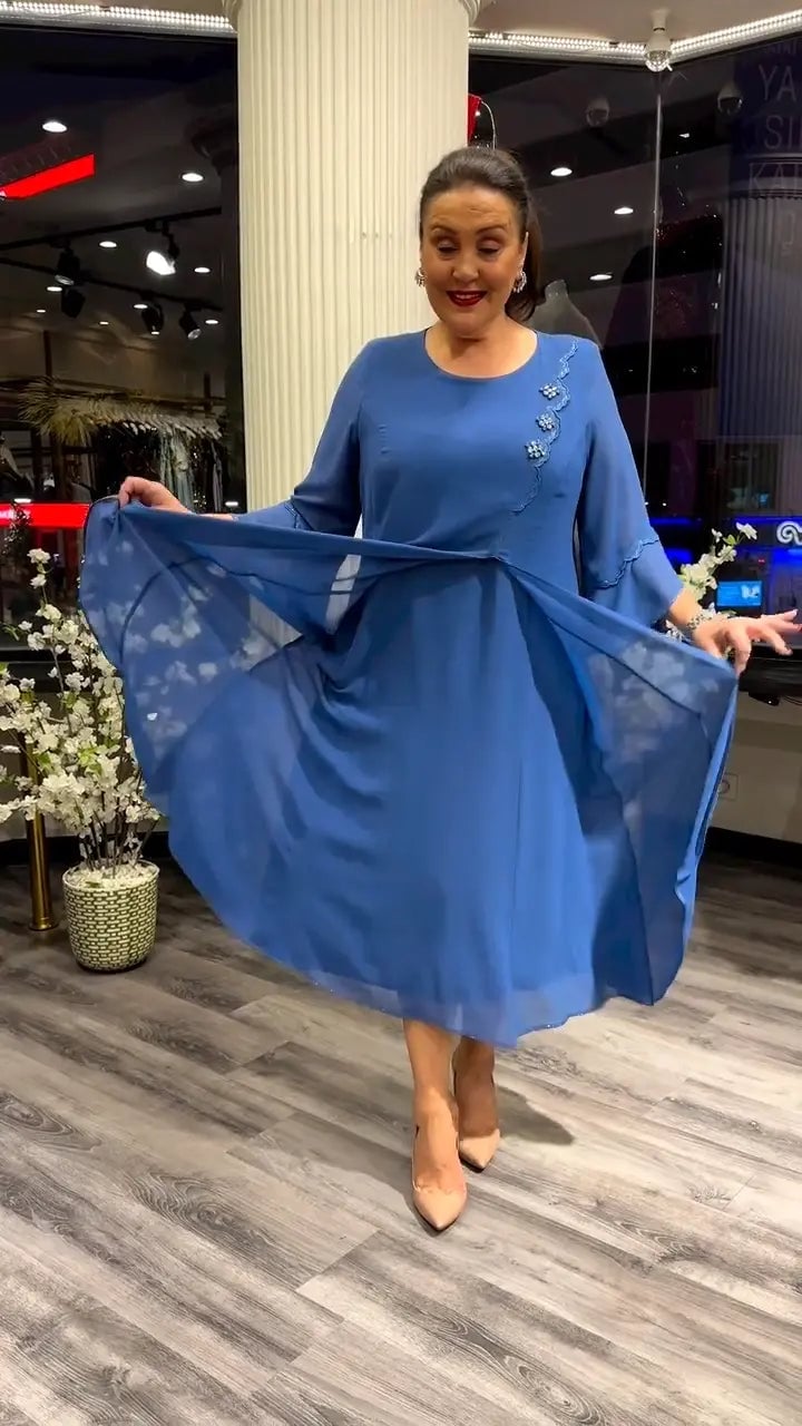 Doris – Robe en mousseline à col rond